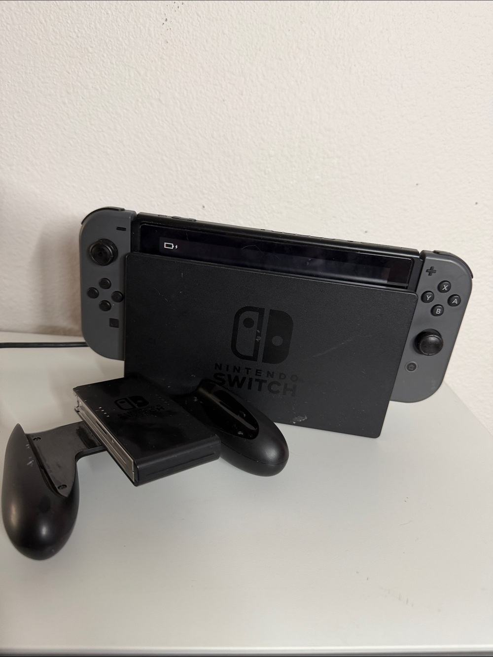 Nintendo Switch Console with Dark Gray Joy-Con and Dock